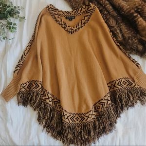 Boutique Poncho Sweater with Fringe and Sleeves
